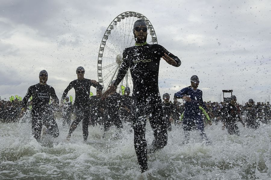 RIMINI, ITALY - MAY 24: Athletes get inside the water at the starting point of the swimming course during the 2015 ETU Challenge Rimini European Championship Half Distance on May 24, 2015 in Rimini, Italy.  (Photo by Gonzalo Arroyo Moreno/Getty Images)