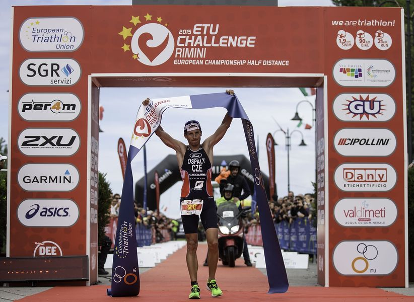 RIMINI, ITALY - MAY 24:  Male athlete Filip Ospaly from the Czeck Republic arrives at the finish line as he wins the 2015 ETU Challenge Rimini European Championship Half Distance on May 24, 2015 in Rimini, Italy.  (Photo by Gonzalo Arroyo Moreno/Getty Images) *** Local Caption *** Filip Ospaly