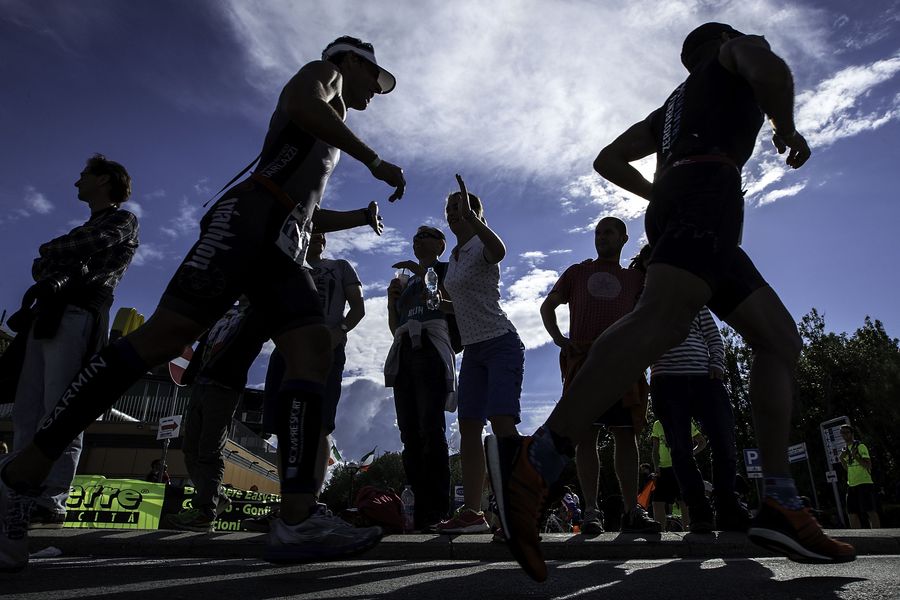 RIMINI, ITALY - MAY 24: Spectators clash hands with athletes during the running course at the 2015 ETU Challenge Rimini European Championship Half Distance on May 24, 2015 in Rimini, Italy.  (Photo by Gonzalo Arroyo Moreno/Getty Images)